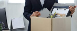 Person packing office after being terminated